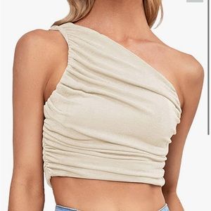 Brand new one shoulder champagne colored crap top